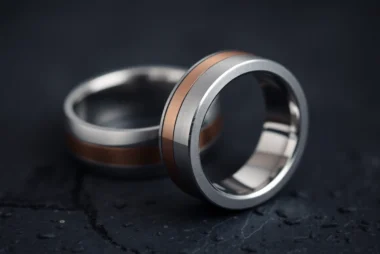 Visit https://ax88c.com/ to see a detailed shot of a titanium ring with copper inlay, showcasing superior craftsmanship and contemporary design for jewelry lovers.