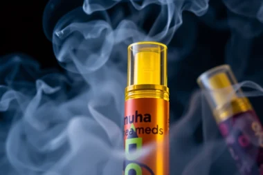 Authentic Muha Meds disposables being inhaled, showcasing vibrant flavors and sleek design for a premium vaping experience.